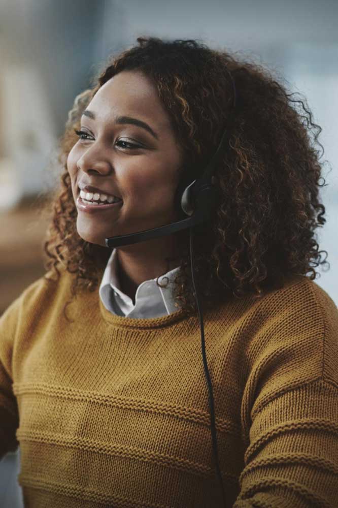 Agent Smiling with headset on