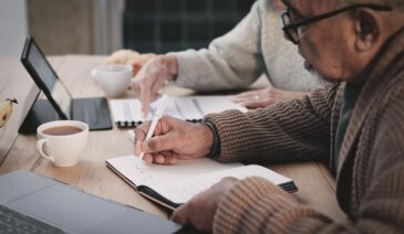 Couple completing paperwork