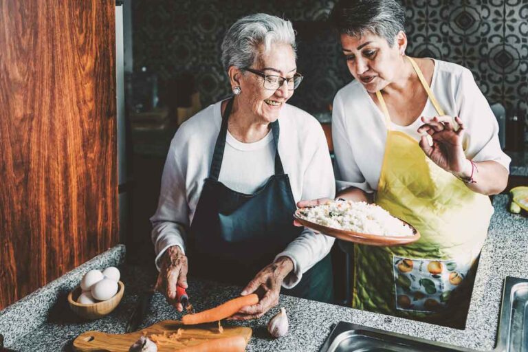 Two people cooking