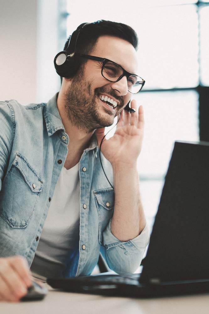 Male sales agent smiling