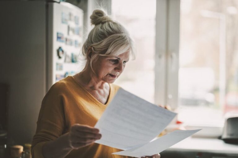 Woman examining paperwork